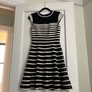 Unique cap sleeve black and white striped fit and flare dress